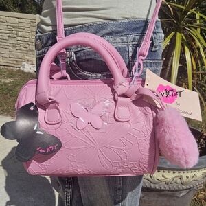 BETSEY JOHNSON PINK EMBOSSED BUTTERFLY BARREL CROSSBODY w/FLUFFY HEART TASSEL